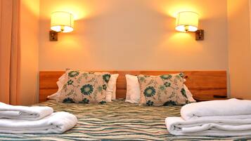 Ropa de cama de alta calidad y minibar