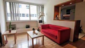 Superior Apartment | Living area | Flat-screen TV