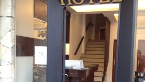 A hotel entrance with a sign reading "Lorenzo Suites Hotel". - Lorenzo Suites Hotel (San Miguel de Tucuman)