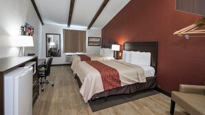 A hotel room with two beds, a desk, a chair, a mirror, and a TV. - Red Roof Inn Lancaster - Strasburg (Lancaster)
