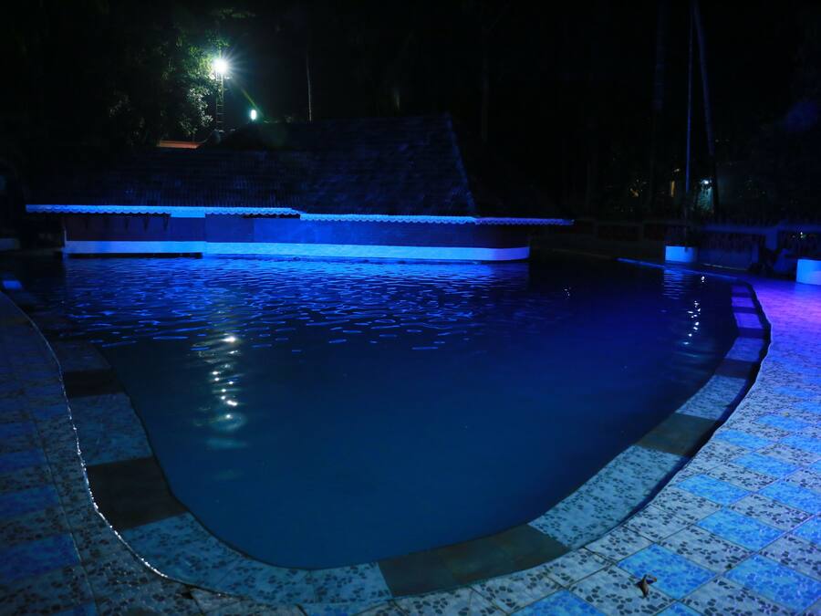 Suite ejecutiva | Piscina al aire libre | Una piscina al aire libre