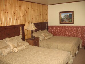 Suite, 2 Double Beds, Kitchenette | Individually decorated, blackout drapes, free WiFi