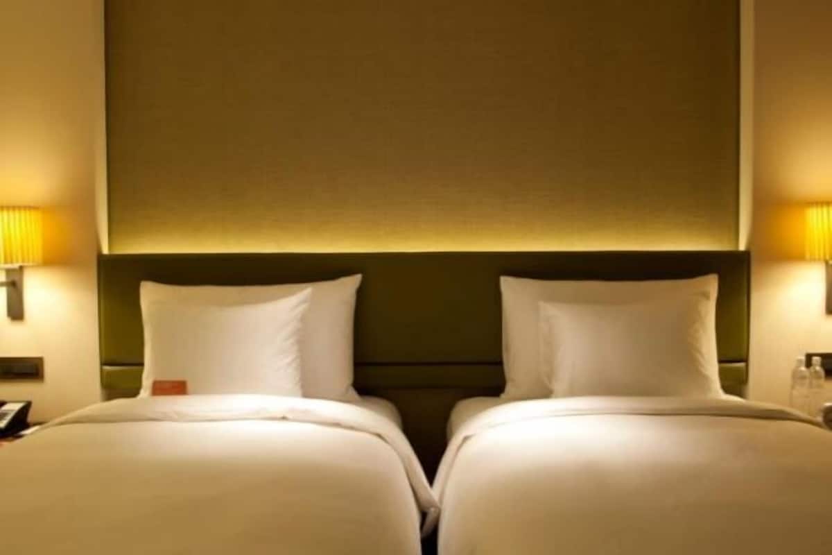 Hypo-allergenic bedding, down comforters, pillowtop beds, in-room safe