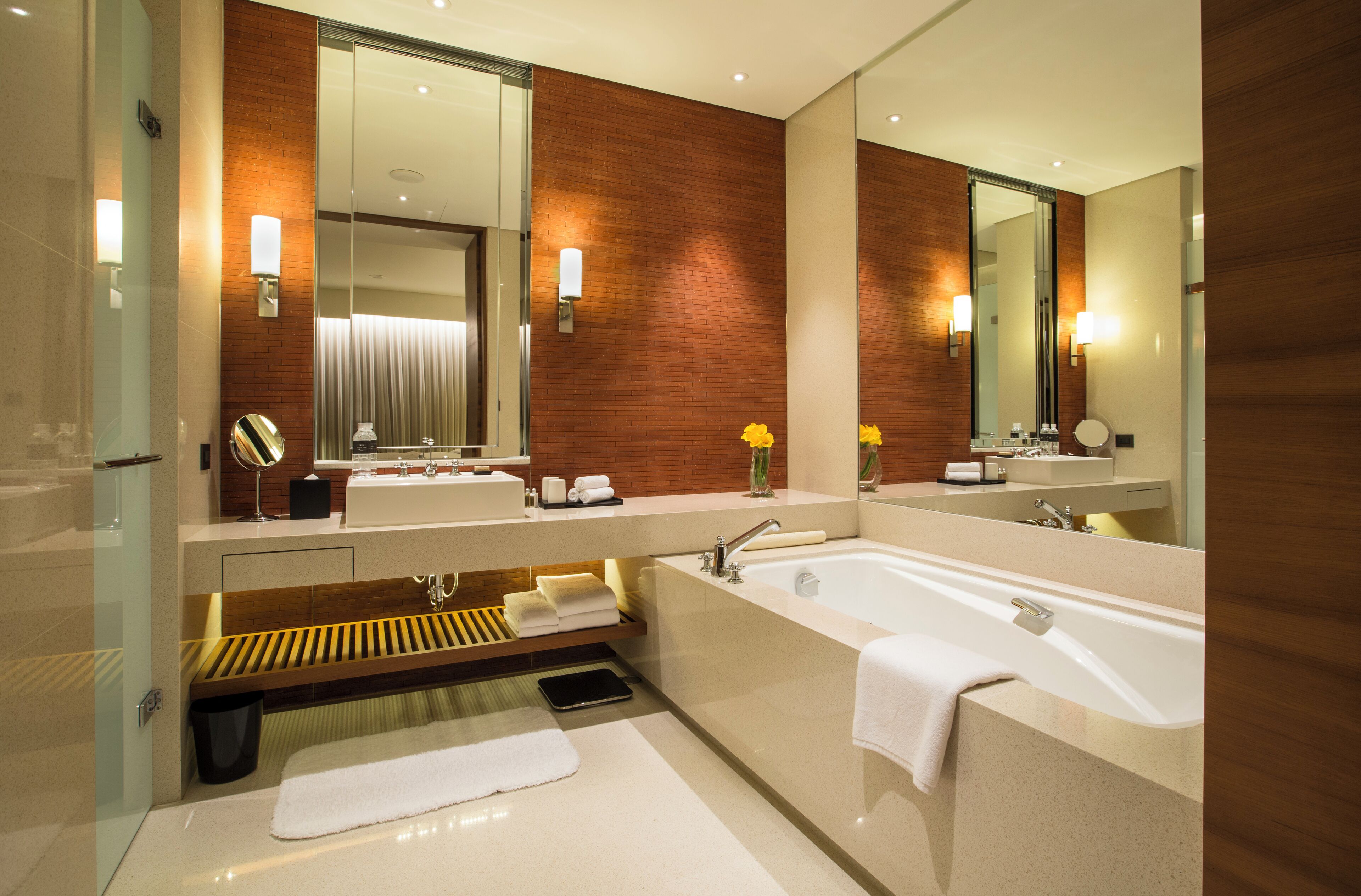 separate bathtub and shower, deep-soaking bathtub, designer toiletries