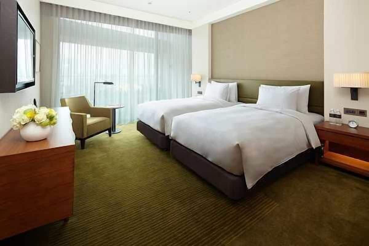 Hypo-allergenic bedding, down comforters, pillowtop beds, in-room safe