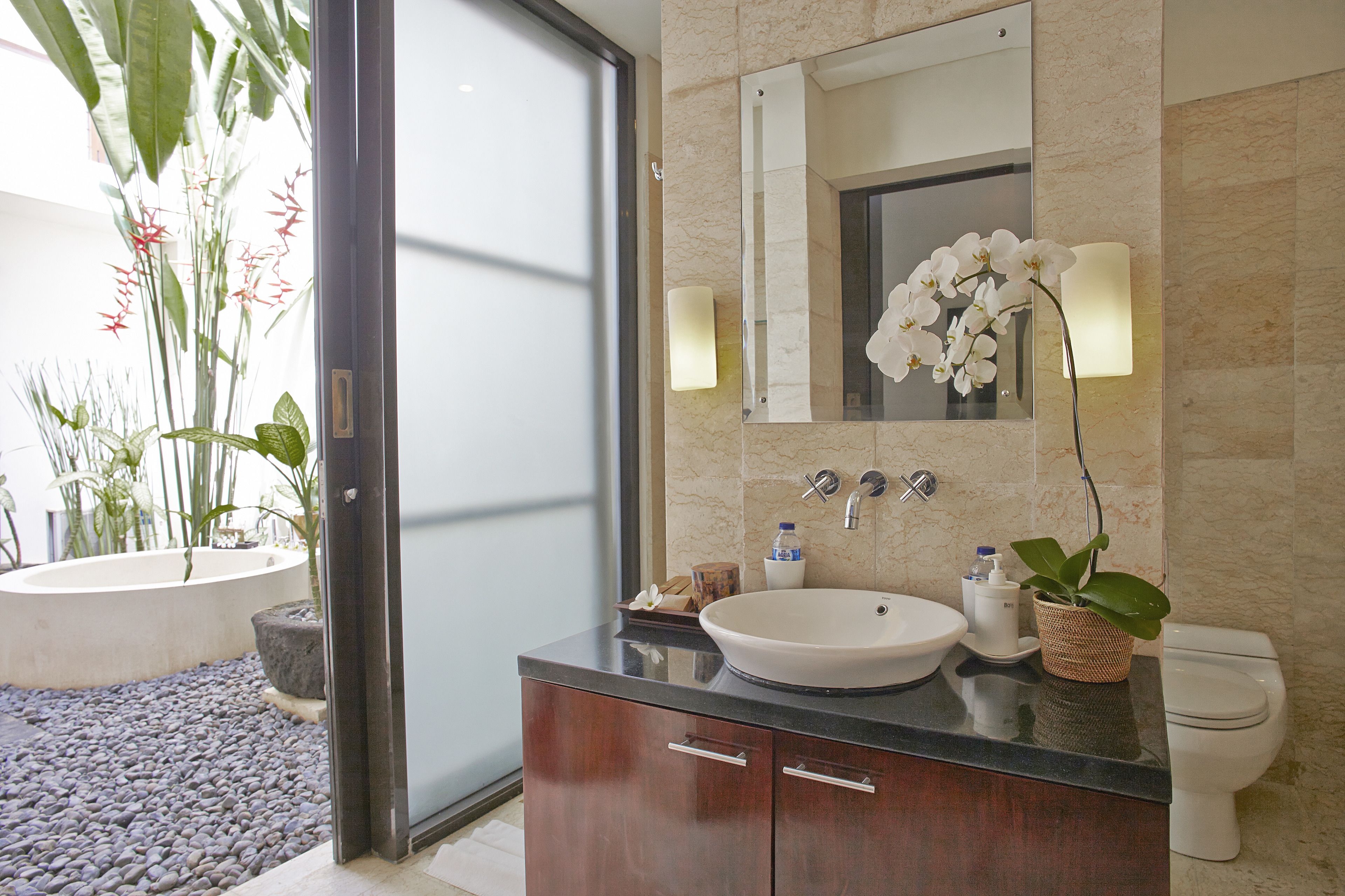 separate bathtub and shower, deep-soaking bathtub, rainfall showerhead