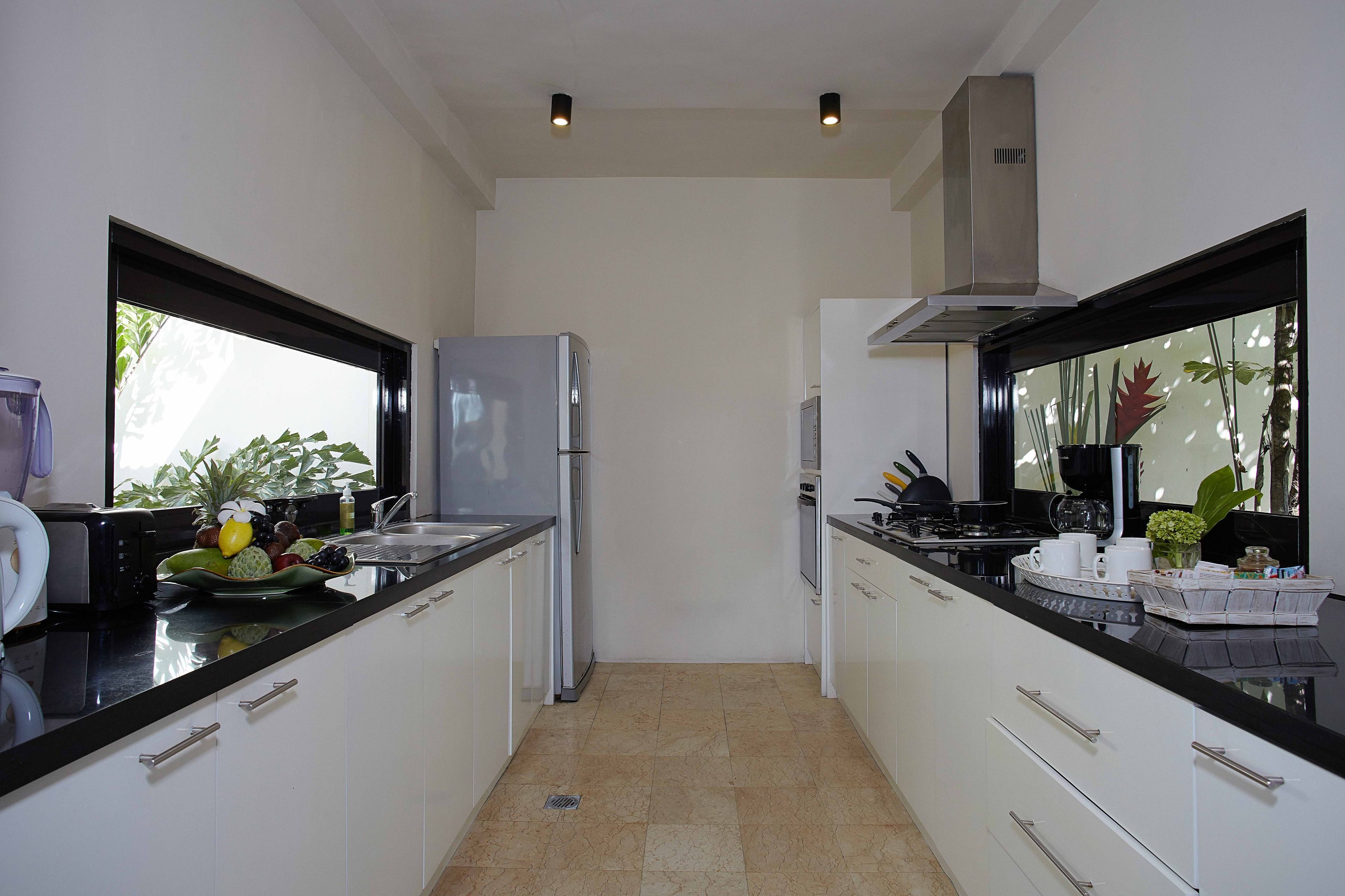 luxury villa, 4 bedrooms, private pool, partial sea view | private kitchen | full-sized fridge, microwave, oven, stovetop
