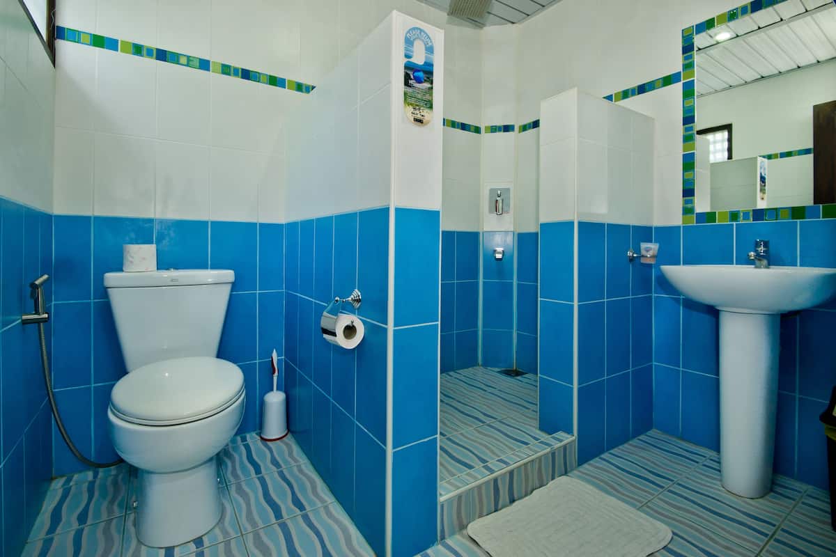 shower, rainfall showerhead, slippers, towels