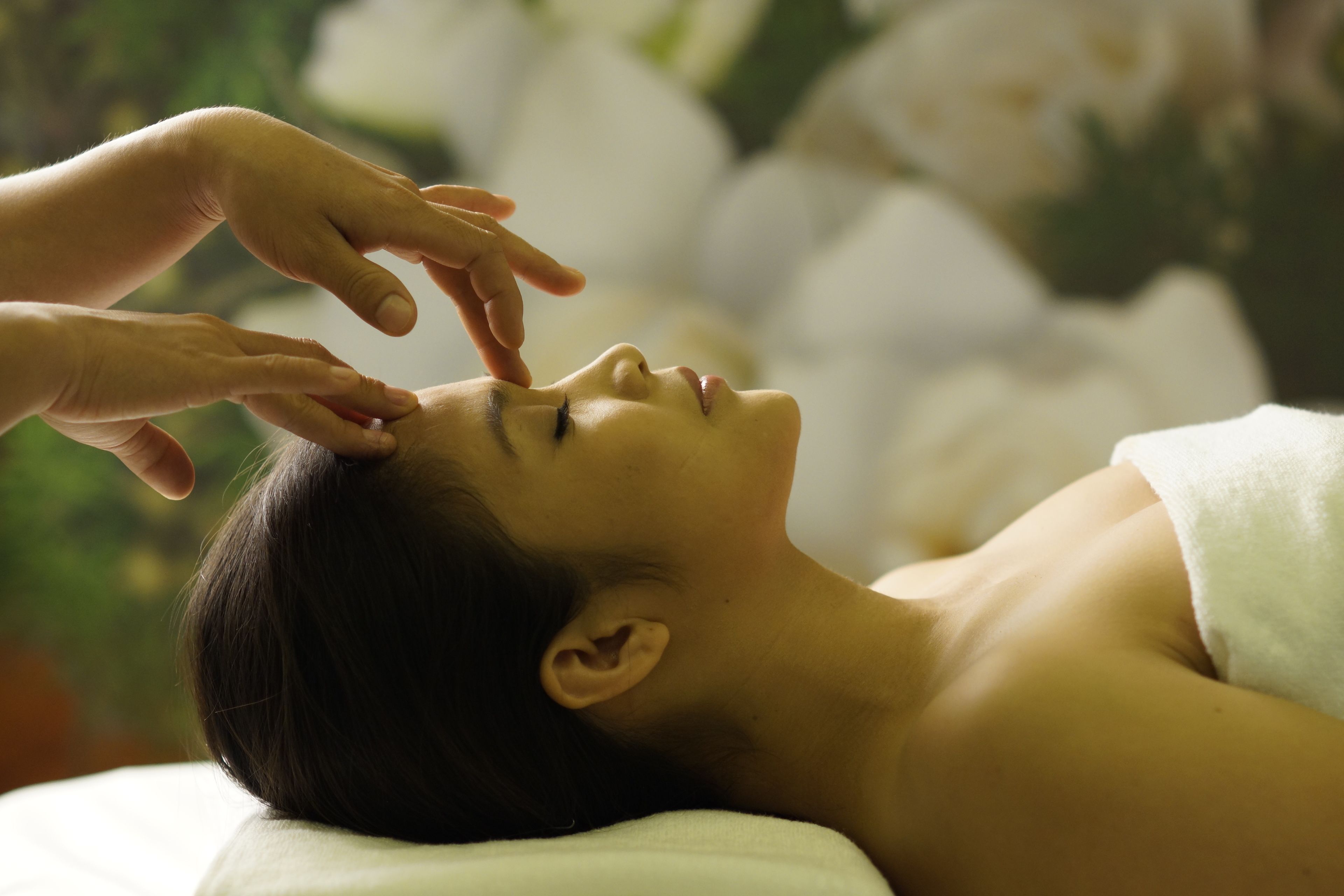 A person receiving a facial treatment.