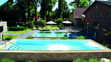 Indoor pool, 3 outdoor pools, open 8:00 AM to 8:00 PM, pool umbrellas