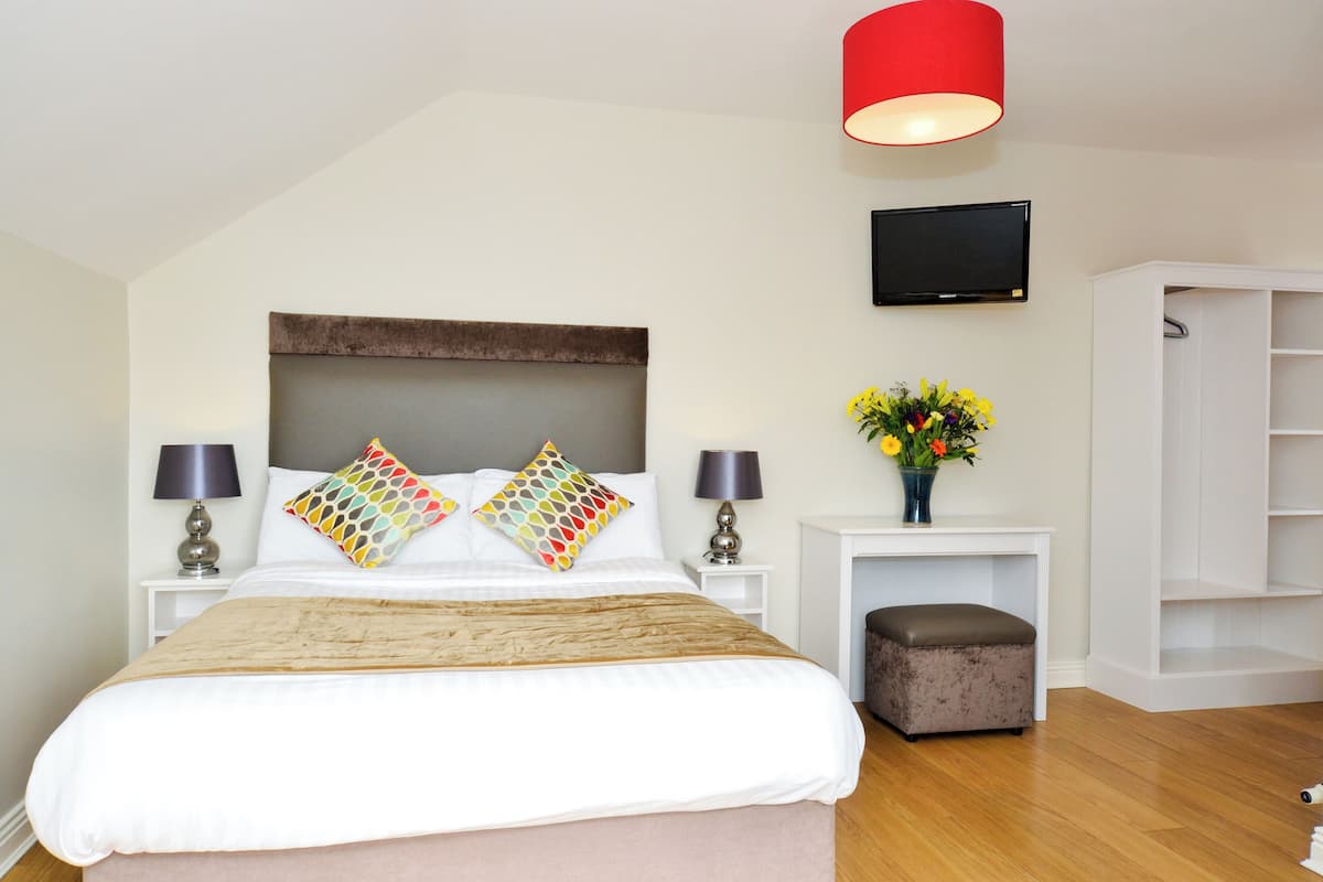 Iron/ironing board (on request), WiFi (free), bed sheets