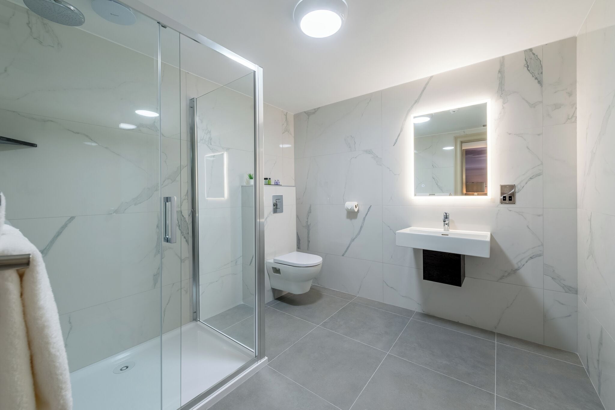 Shower, rainfall showerhead, eco-friendly toiletries, hair dryer