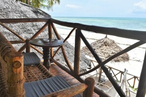 Bungalow, Balcony, Oceanfront | Balcony - Sea View Lodge Boutique Hotel (Jambiani)