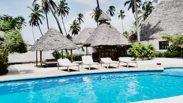 Outdoor pool, pool umbrellas, sun loungers