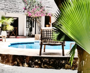 Outdoor pool, pool umbrellas, sun loungers