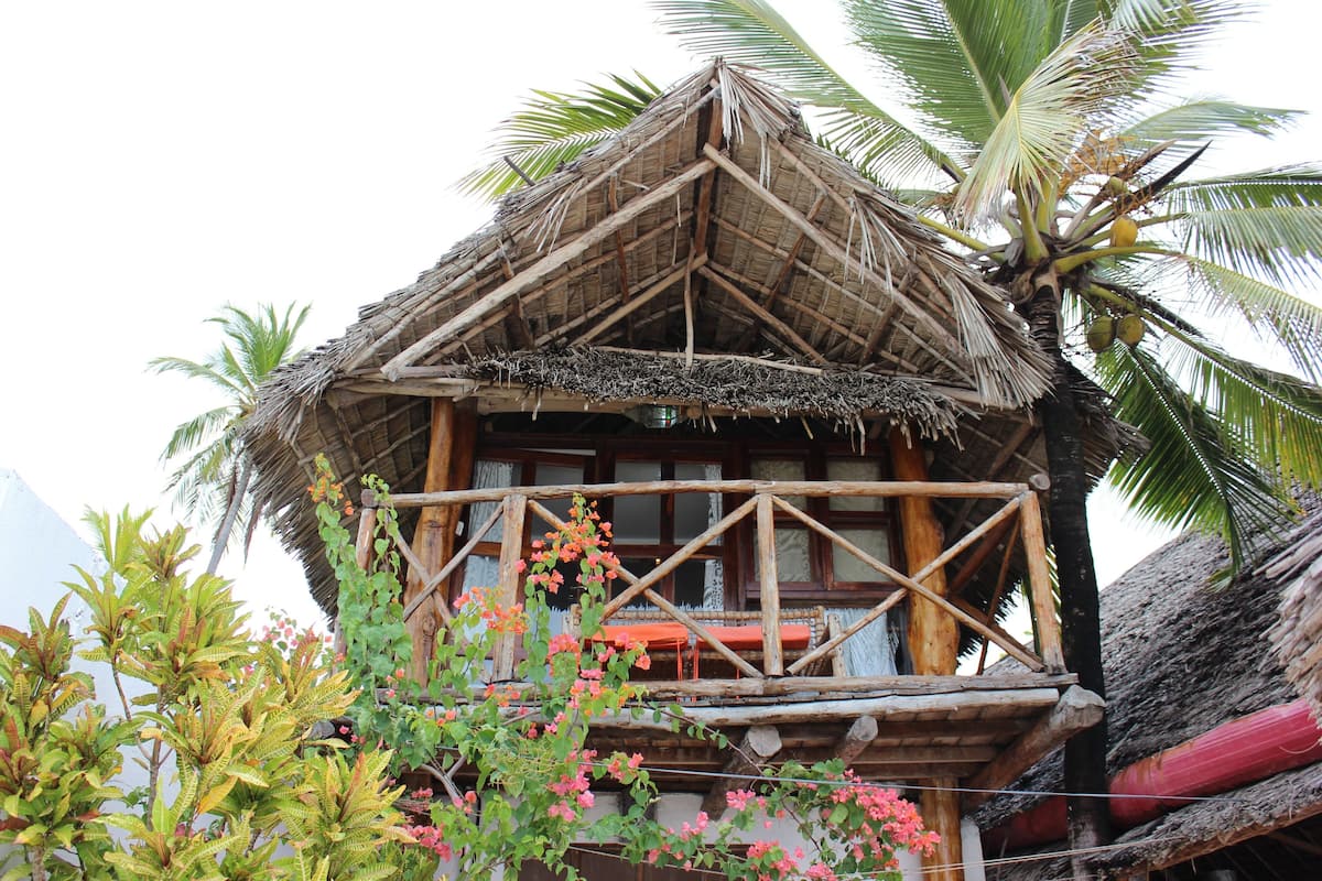 Bungalow, Balcony, Oceanfront | In-room safe, WiFi (free), individually decorated