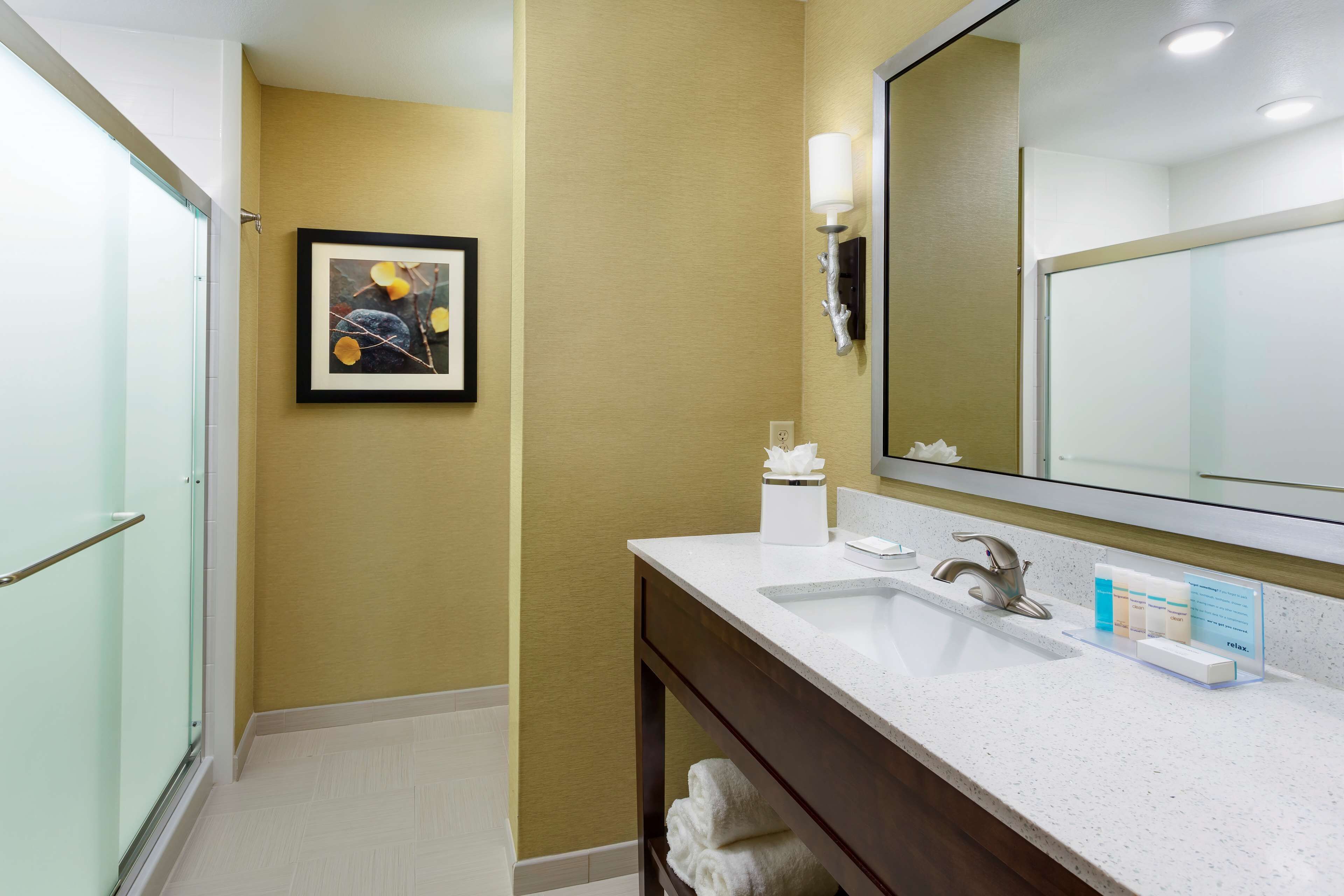 studio suite, 1 king bed | bathroom | hair dryer, towels