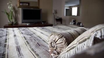 Premium bedding, down duvets, desk, laptop workspace