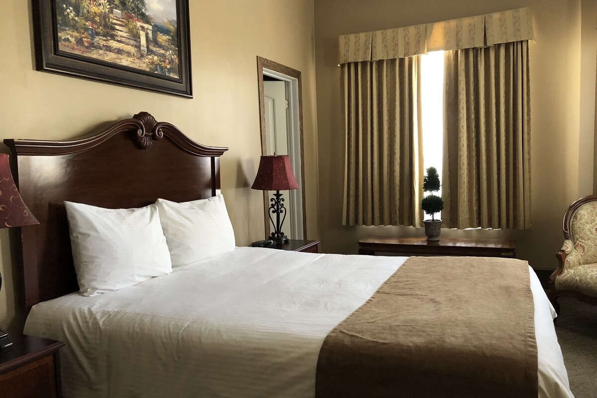 Premium bedding, down comforters, desk, laptop workspace