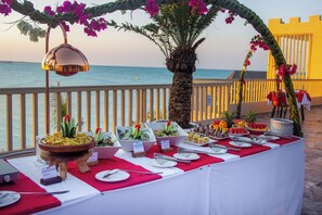 4 restaurants, breakfast, lunch, dinner served; international cuisine  - Reef & Beach Resort (Jambiani)