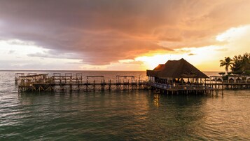 Private beach, white sand, sun loungers, beach umbrellas