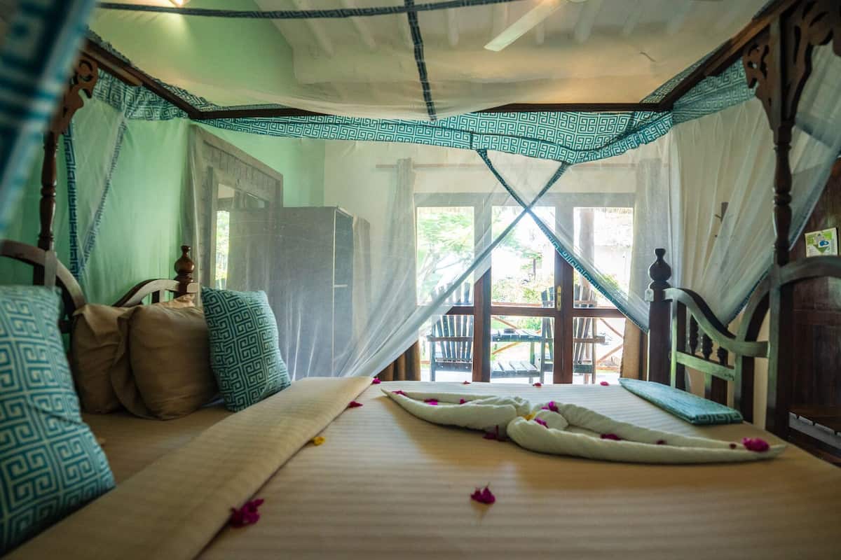 Down duvets, memory-foam beds, in-room safe, desk