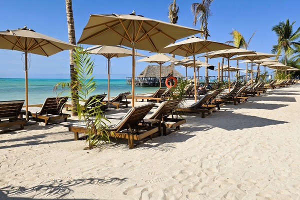 Private beach, white sand, sun loungers, beach umbrellas