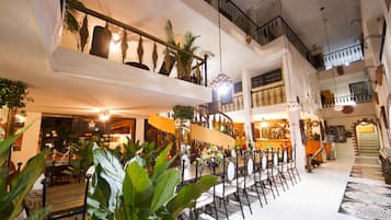Breakfast, lunch, dinner served; Caribbean cuisine, pool views