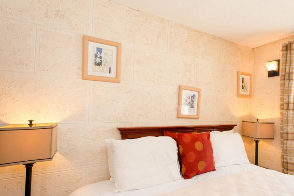 In-room safe, desk, blackout curtains, iron/ironing board