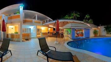 Outdoor pool, open 7 AM to 8 PM, pool umbrellas, pool loungers