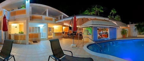 Outdoor pool, open 7 AM to 8 PM, pool umbrellas, sun loungers