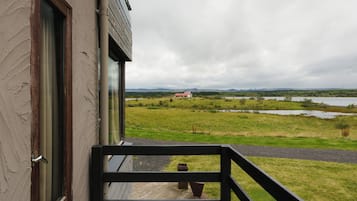 Family Room, Balcony, Lake View | Terrace/patio