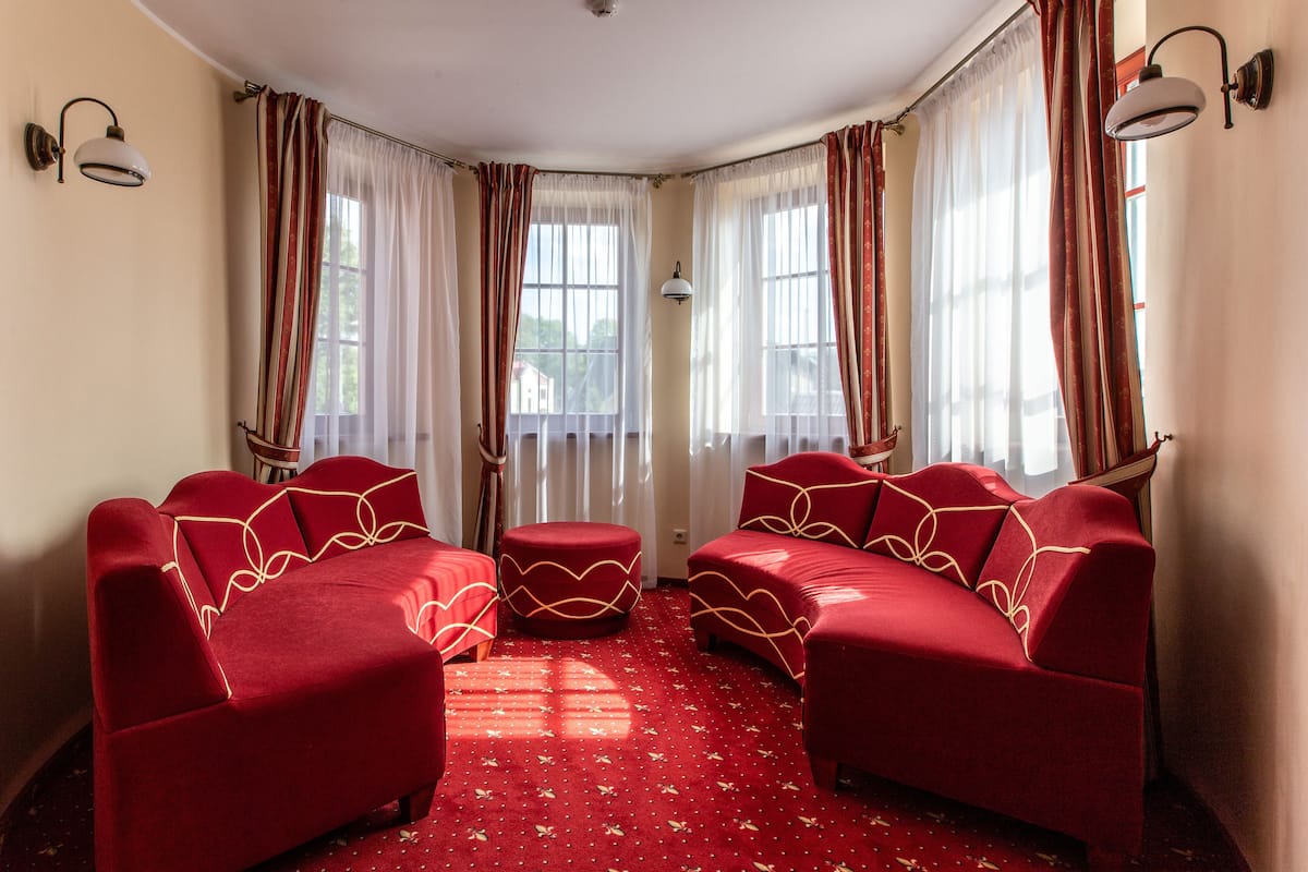 deluxe double or twin room | in-room safe, desk, laptop workspace, soundproofing