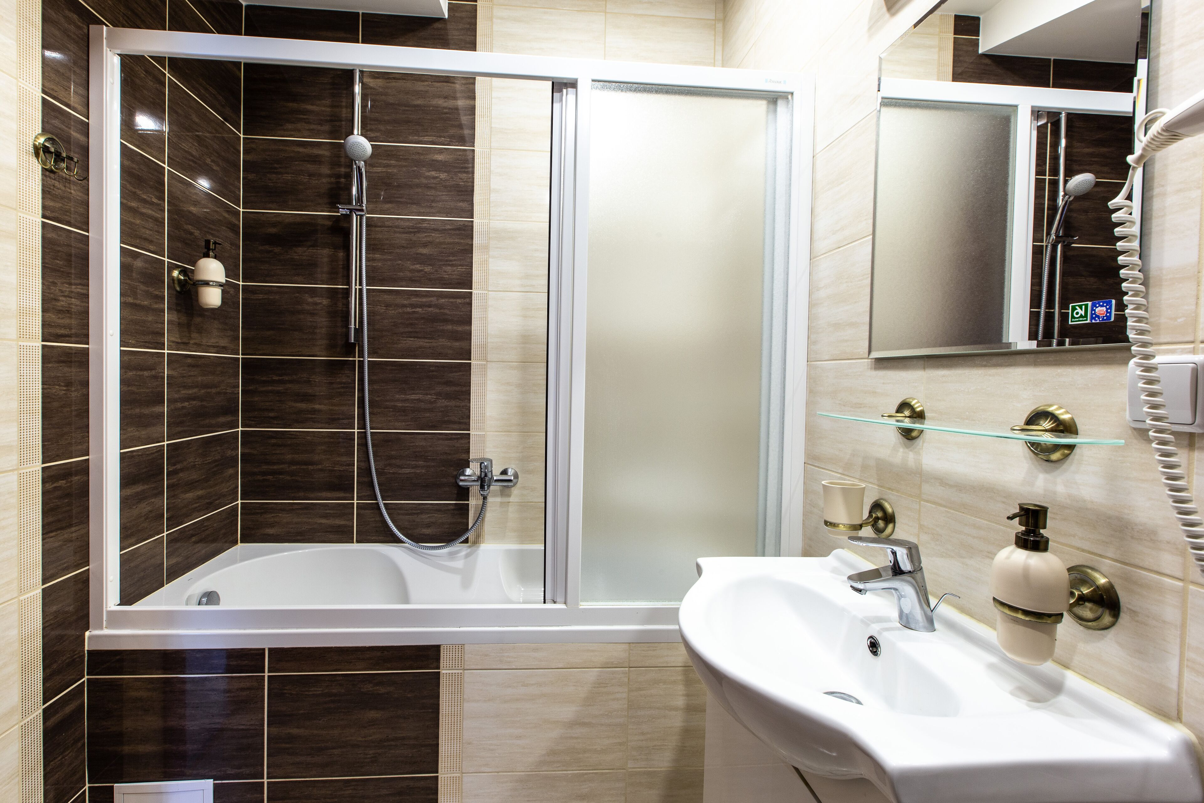 family apartment | bathroom | bathtub, deep-soaking bathtub, free toiletries, hair dryer