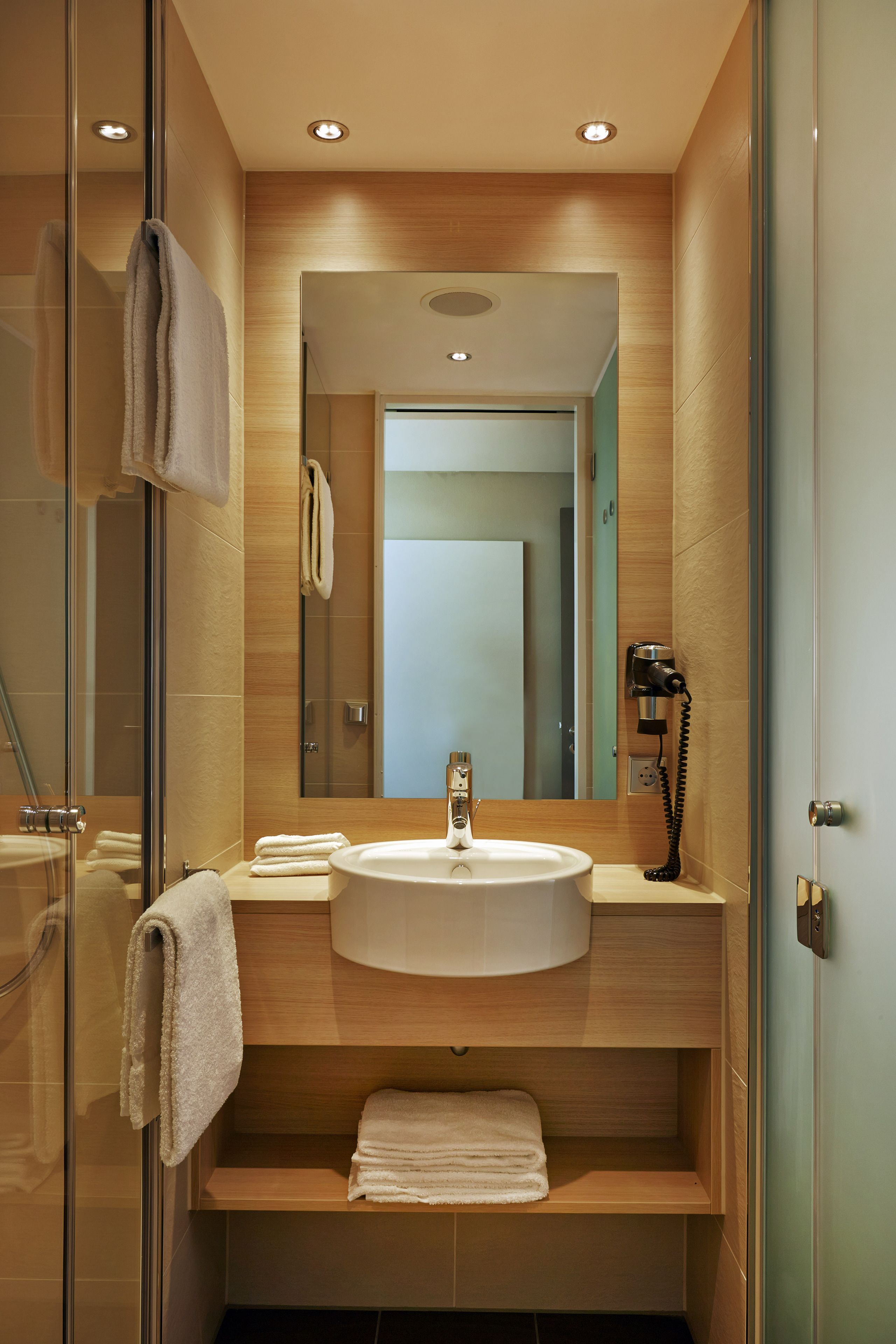 shower, rainfall showerhead, hair dryer, towels