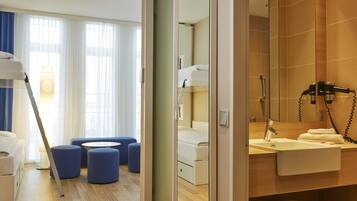 Hypo-allergenic bedding, desk, blackout drapes, soundproofing