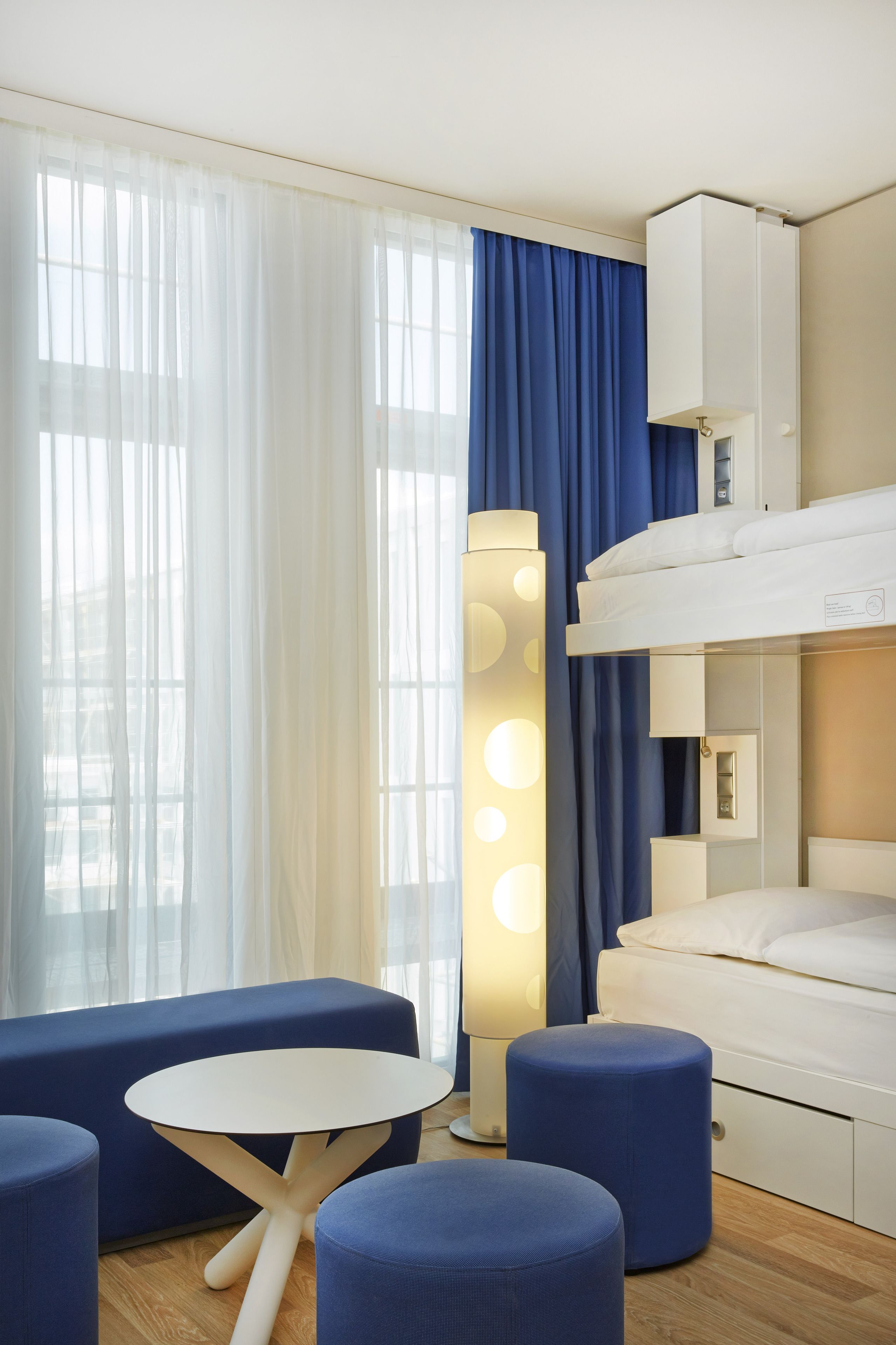 comfort quadruple room | hypo-allergenic bedding, desk, blackout curtains, soundproofing