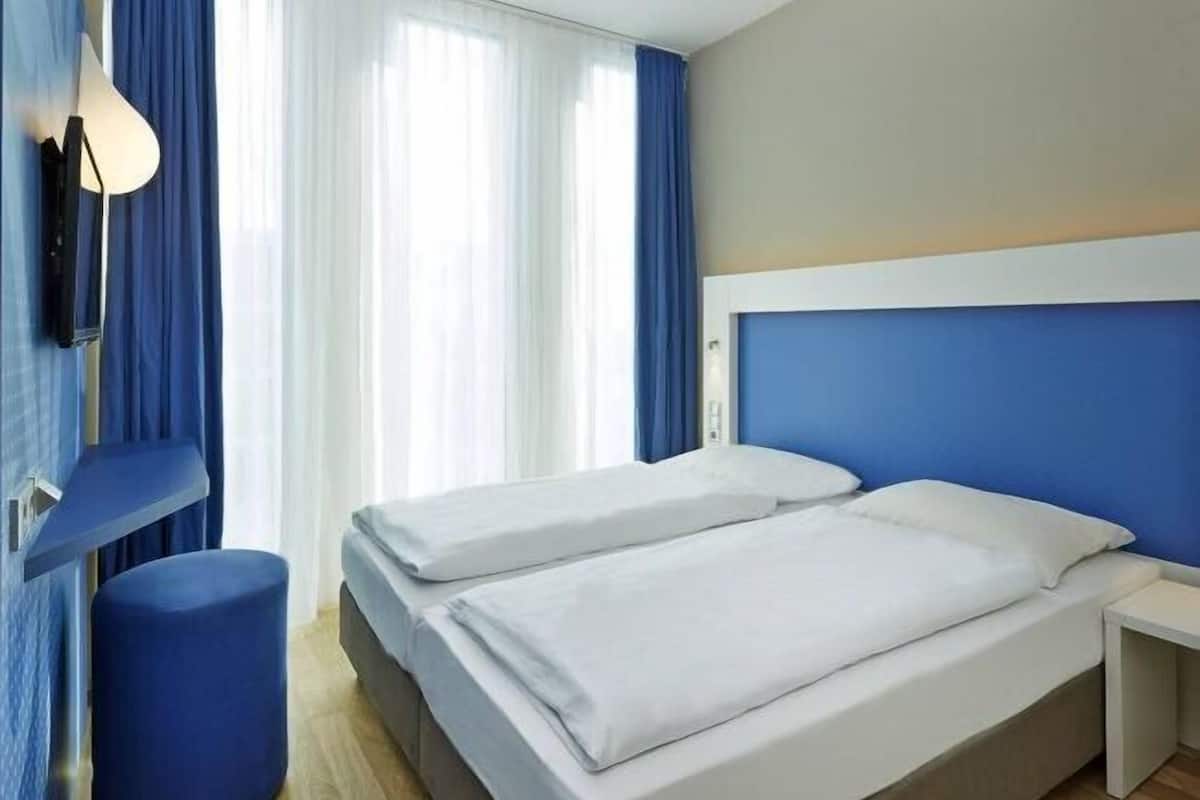 Hypo-allergenic bedding, desk, blackout curtains, soundproofing
