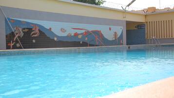 Outdoor pool, pool umbrellas, pool loungers