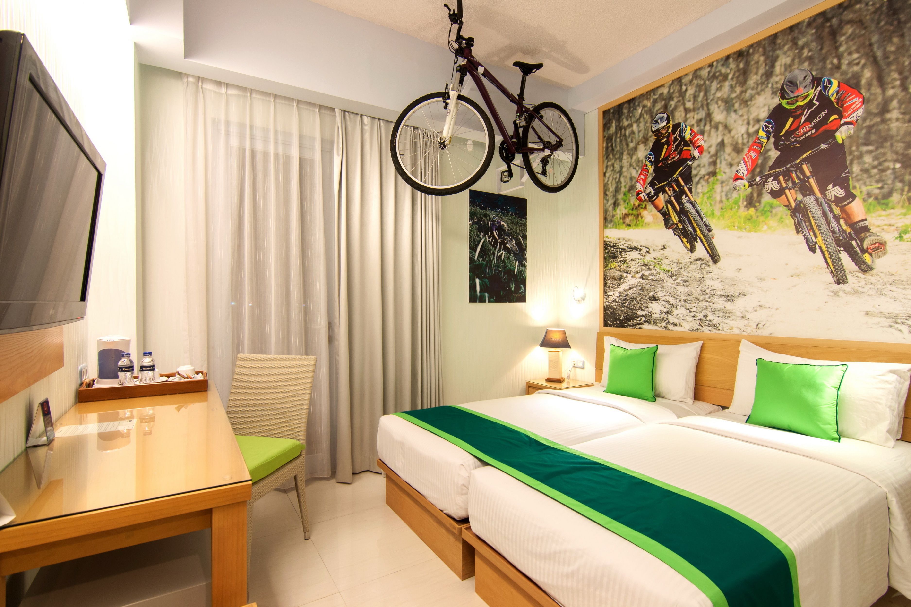 premium double room, balcony | in-room safe, individually decorated, desk, iron/ironing board