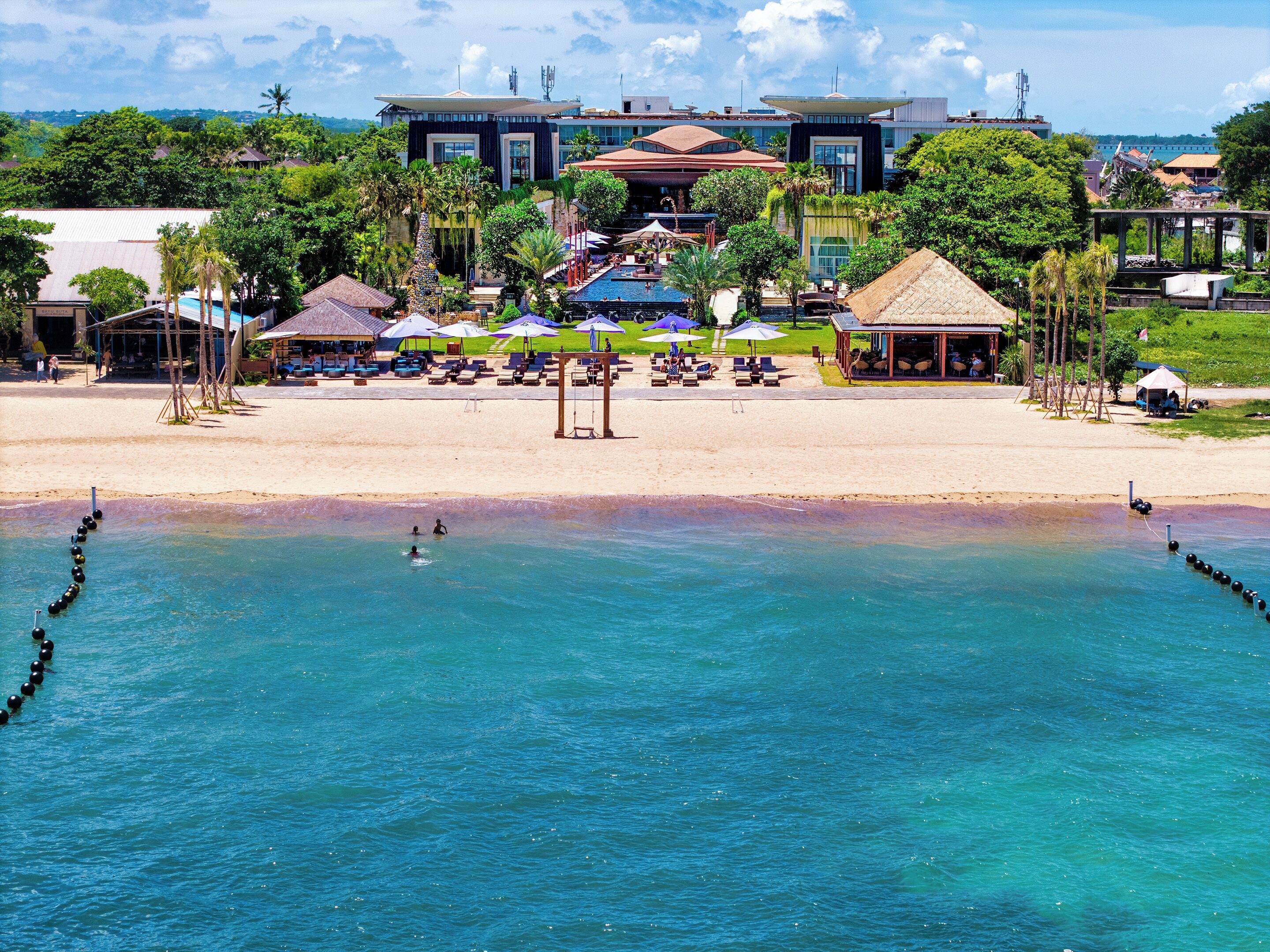 On the beach, white sand, free beach cabanas, sun-loungers