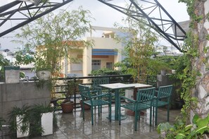 Outdoor dining - Minh Chau Hotel (Ho Chi Minh City)