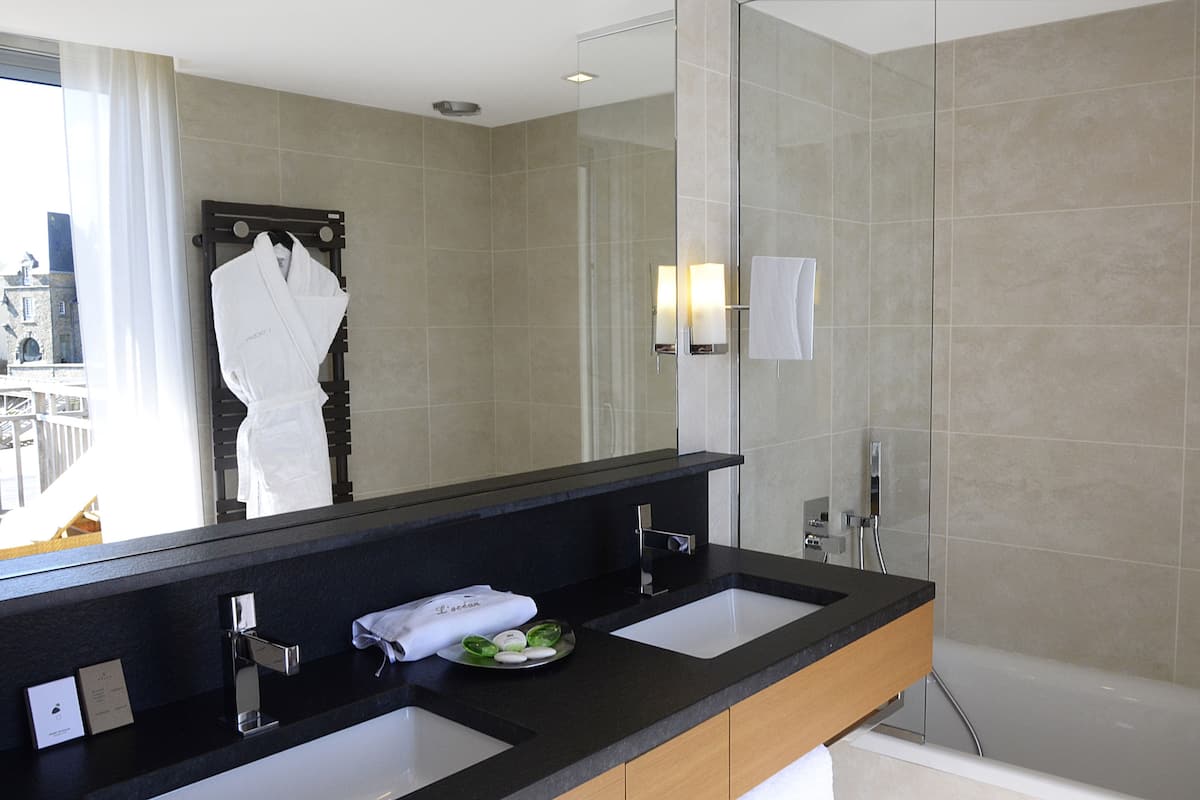 hair dryer, bathrobes, towels