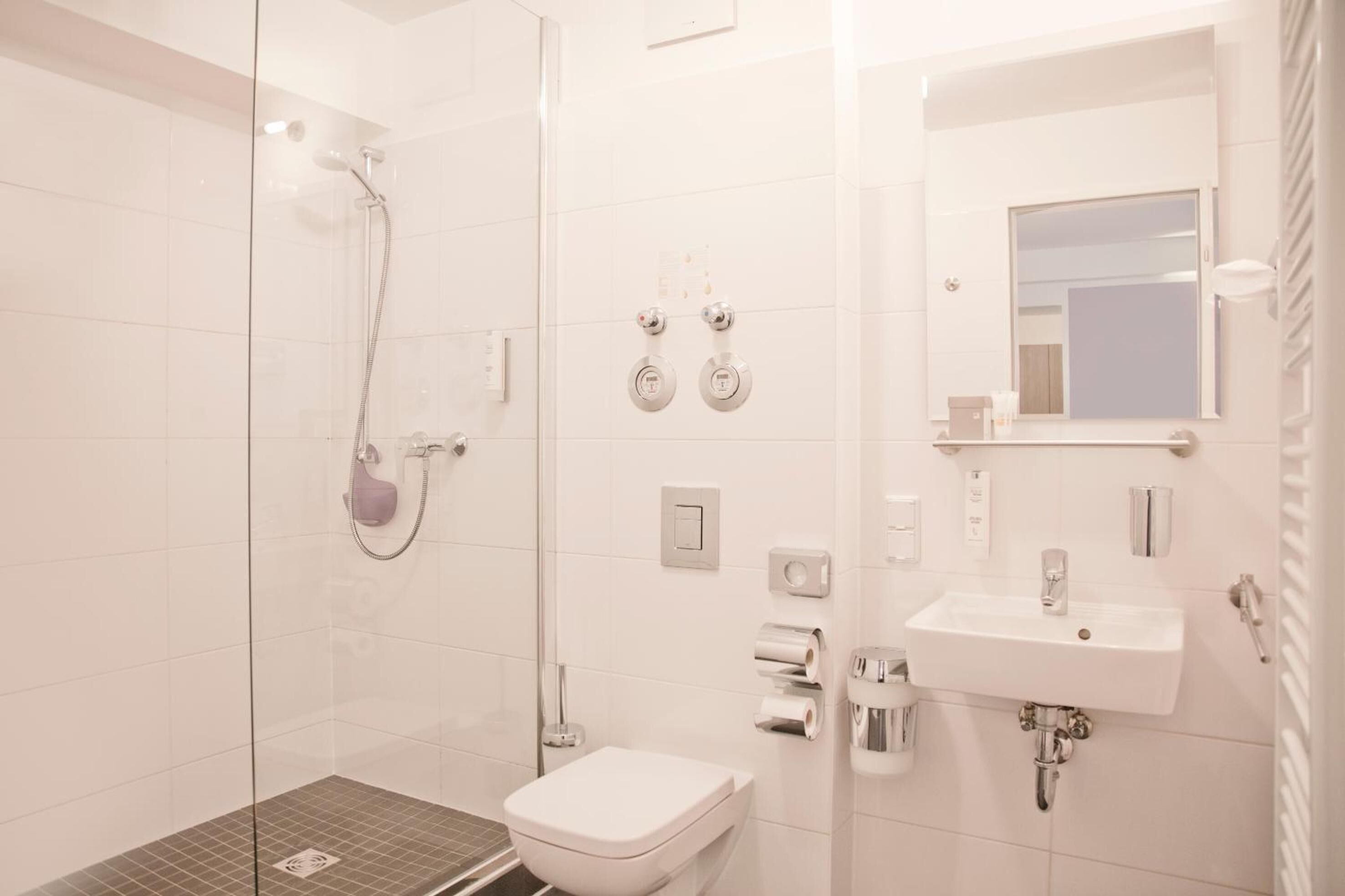 shower, free toiletries, hair dryer, slippers