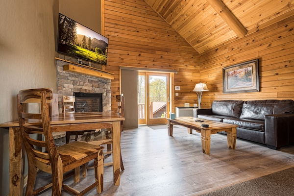C 50R - Comfort Cabin, 1 King bed, Pet Friendly, Mountainside (May hear neighbors) | Living area | 50-inch flat-screen TV with cable channels, TV
