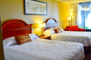 Premium bedding, pillow-top beds, desk, blackout curtains