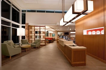 Hotel entrance and lobby at Hyatt Place Houston / The Woodlands