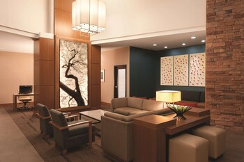 Hotel entrance and lobby at Hyatt Place Houston / The Woodlands