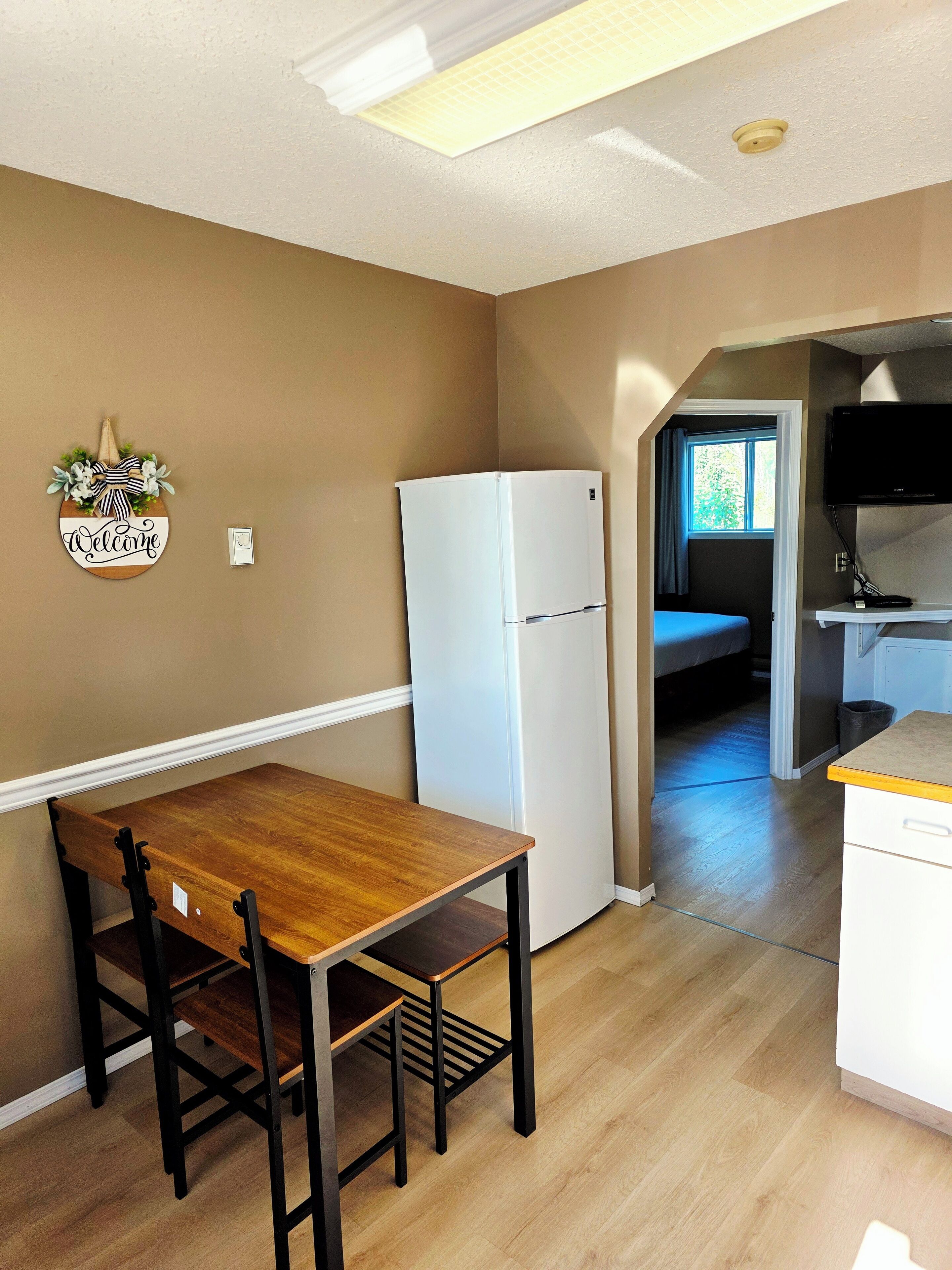 Apartment , 1 King and 2 Doubles, Main floor, Kitchen | Private kitchen | Fridge, microwave, coffee/tea maker