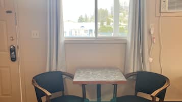 Economy Suite | Living area | Flat-screen TV